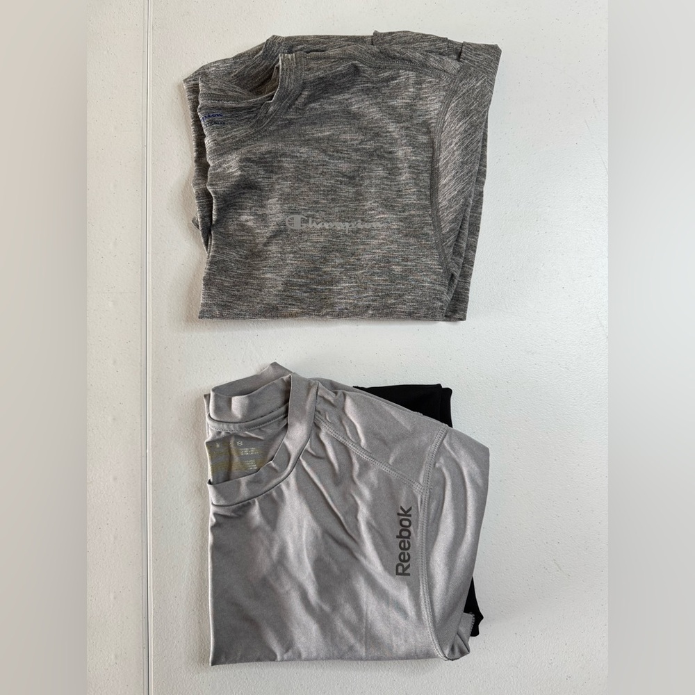 2 Activewear Shirts - Reebok and Champion Branded Size Medium